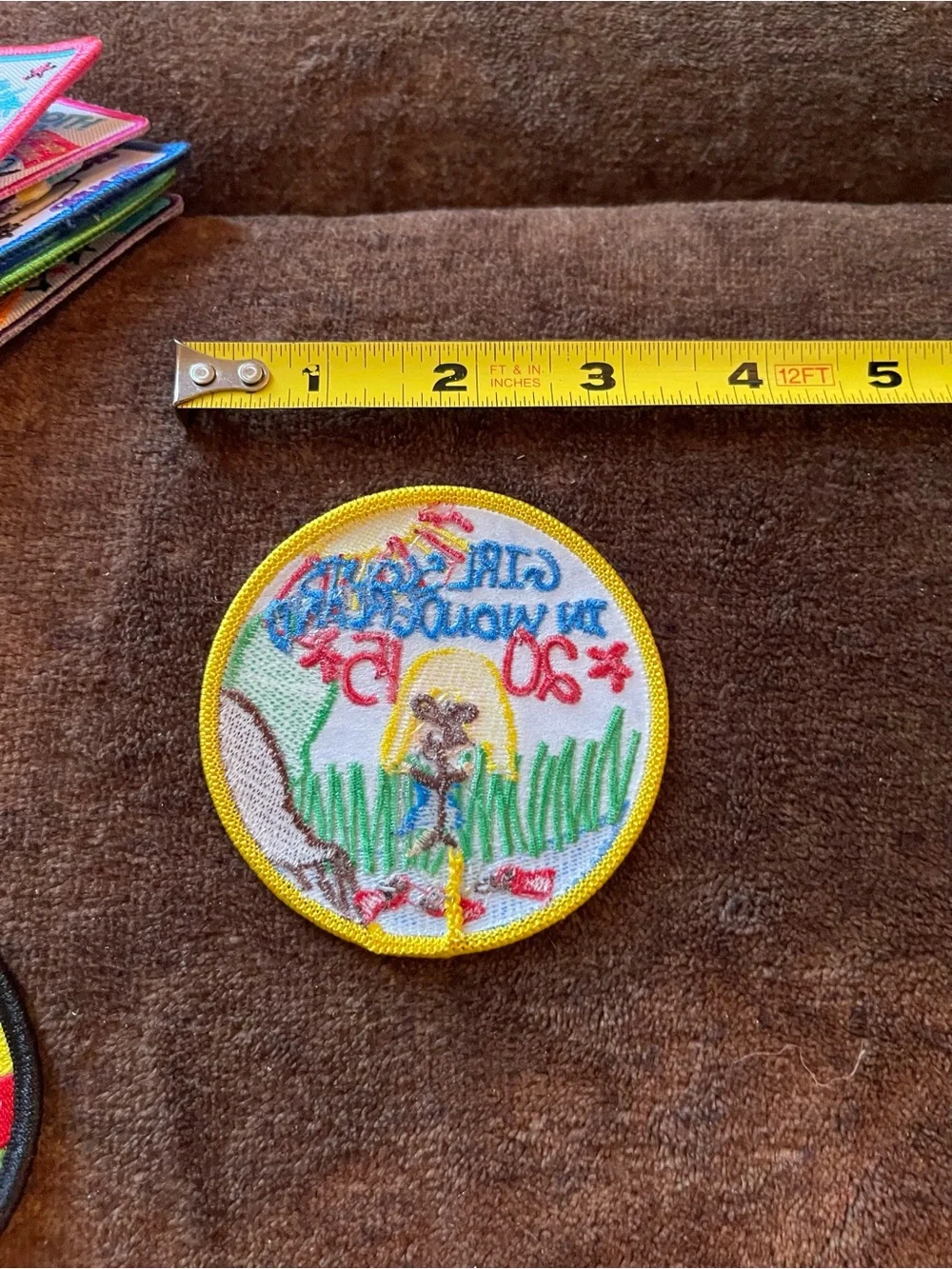 Girl Scouts sew patches